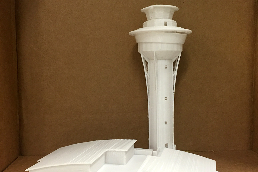 Model of an unusually shaped air traffic control tower.