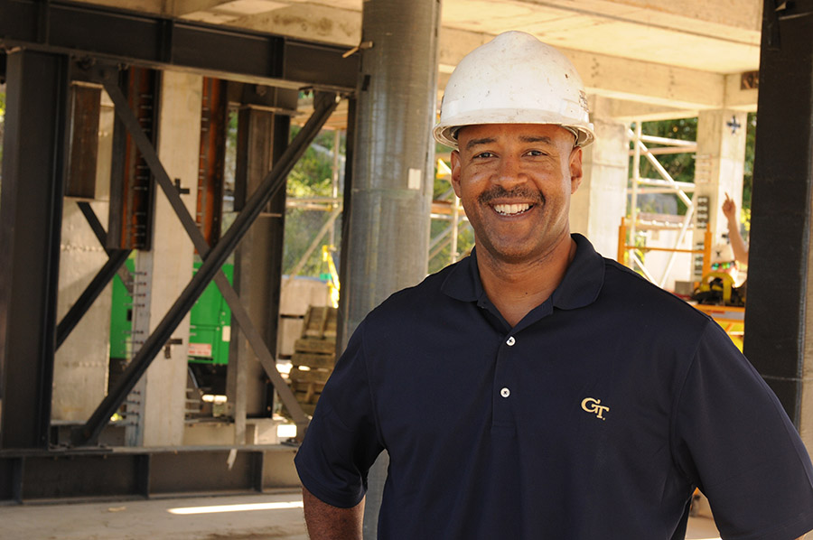 Reginald DesRoches with the structure his research team constructed to test earthquake retrofits for reinforced concrete buildings. (Photo: Gary Meek)