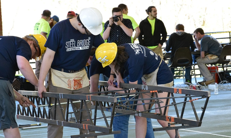 Members of the ASCE steel bridge team put together their design at the Carolinas Regional Conference for student chapters April 1. The team, led by Colin Martin and Mihai Mavrodin, won first place and advance to national competition in May. (Photo: Thomas S. Teichmann)