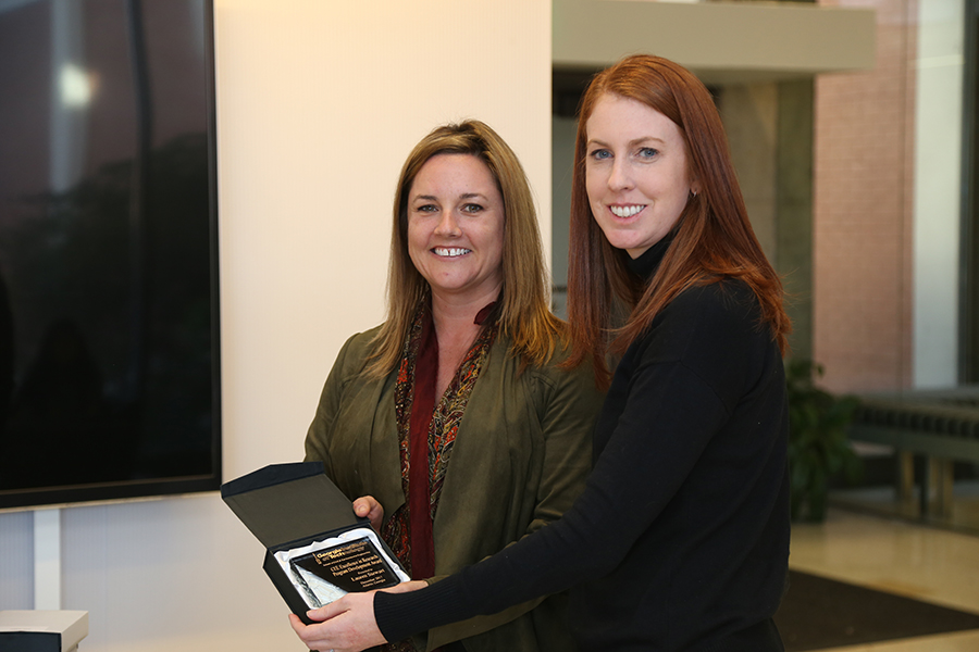 Lauren Stewart receives her award from Interim School Chair Kim Kurtis. (Photo: Jess Hunt-Ralston)