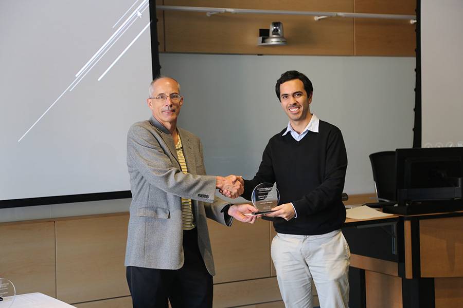 Alejandro Martinez receives his award from Ted Russell