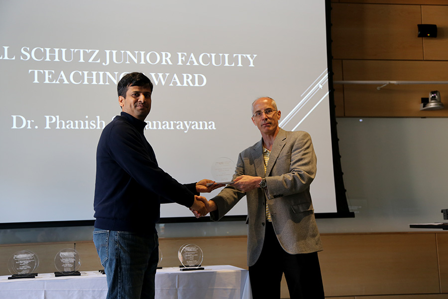 Phanish Suryanarayana receives his award from Ted Russell