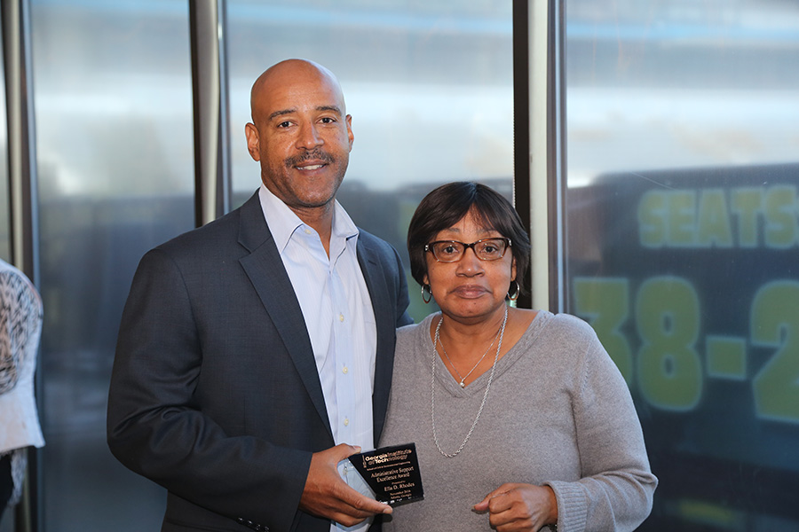 Denise Rhodes receives his award from School Chair Reginald DesRoches. (Photo: Jess Hunt-Ralston)