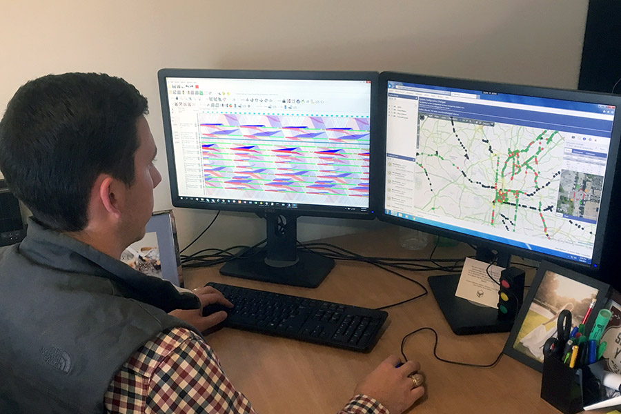 Kimley-Horn engineer Lance Ballard, MSCE 2012, monitors traffic signals in his office after a portion of Interstate 85 collapsed in northeast Atlanta. (Photo Courtesy: Kimley-Horn and Associates)