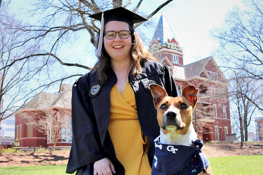 Celia Kornegay poses with her dog, Kramer Burdell, named after the well-known George P. Burdell.