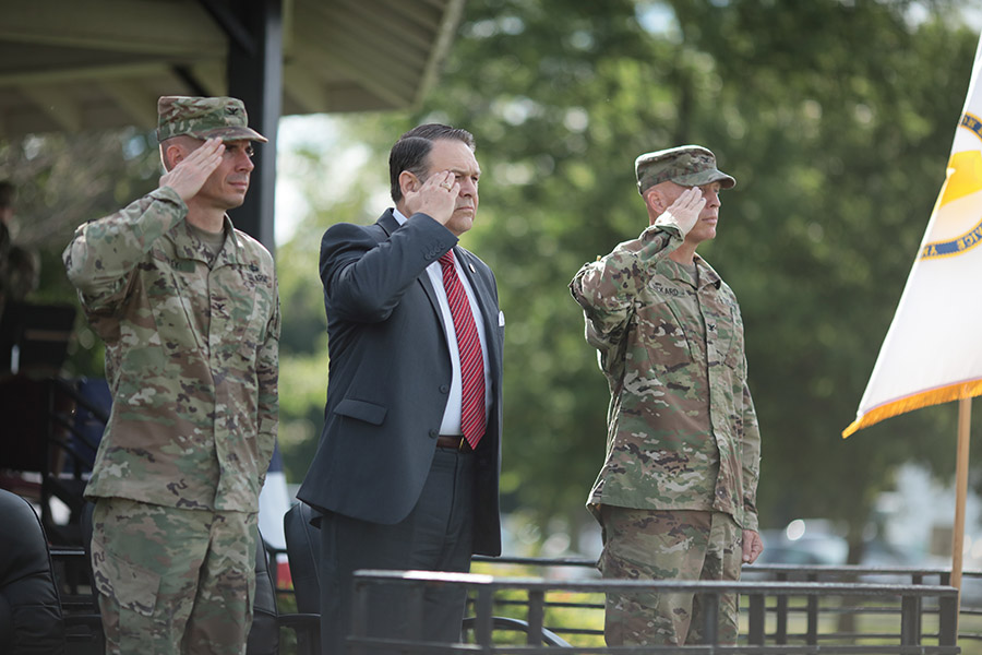 From right to left, Col. Tom Rickard, BSCE 1990, salutes the colors during a change of command ceremony August 4 with Davis D. Tindoll Jr., the Army’s Installation Management Command Atlantic Region director, and Col. Brian P. Foley. Rickard took over leadership of the U.S. Army’s Fort George G. Meade from Foley during the ceremony. (Photo: Fort George G. Meade Public Affairs)