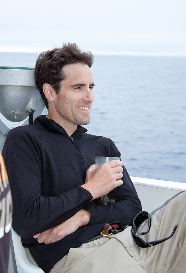 Georgia Tech researcher Frank Stewart aboard a research vessel to collect samples that led to the discovery of the new SAR11 bacteria strains in ocean oxygen minimum zones. (Photo: Heather Olins)
