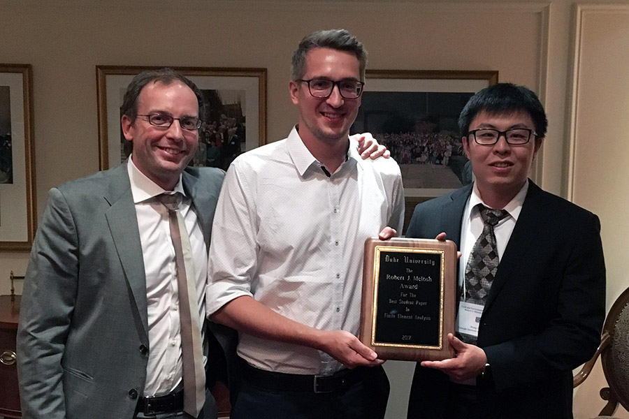 Civil engineering Ph.D. student Heng Chi, right, won the Robert J. Melosh Medal from Duke University in late April. Chi, who is the first Georgia Tech student ever to win the prestigious competition in computational mechanics, stands with co-winner Matthias Mayr, center, from Technical University of Munich, and Duke Associate Professor Guglielmo Scovazzi. (Photo Courtesy: John Dolbow/Duke University)