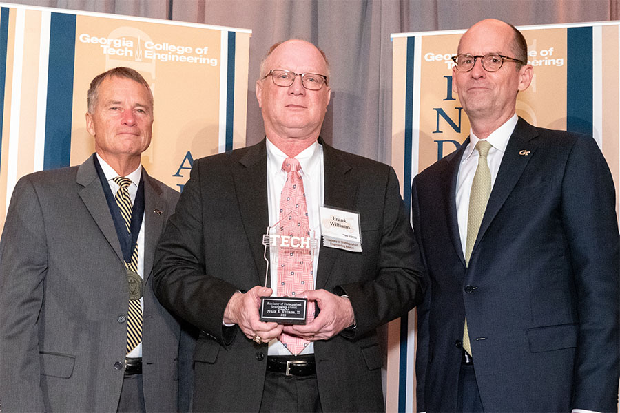 From left, ceremony co-host retired Adm. James A. “Sandy” Winnefeld, Frank Williams, and engineering Dean Steve McLaughlin. (Photo: Gary Meek)