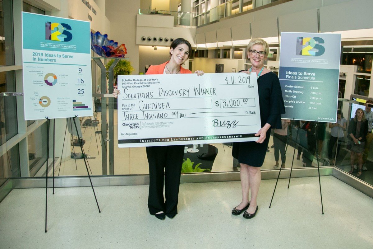 Ideas to Serve solutions winner Culturea's Abigail Cohen with judge Kathleen Kurre.