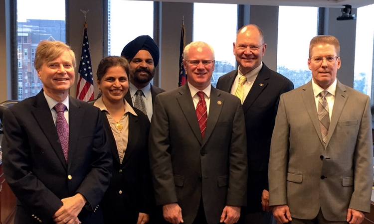 A group of Georgia Tech and Georgia Department of Transportation researchers after they received an AASHTO Sweet Sixteen award from DOT Commissioner Russell McMurry Dec. 8. Their work on corrosion-resistant concrete piles for marine environments has been used on bridges in Georgia and is being tested for use in nearby states.