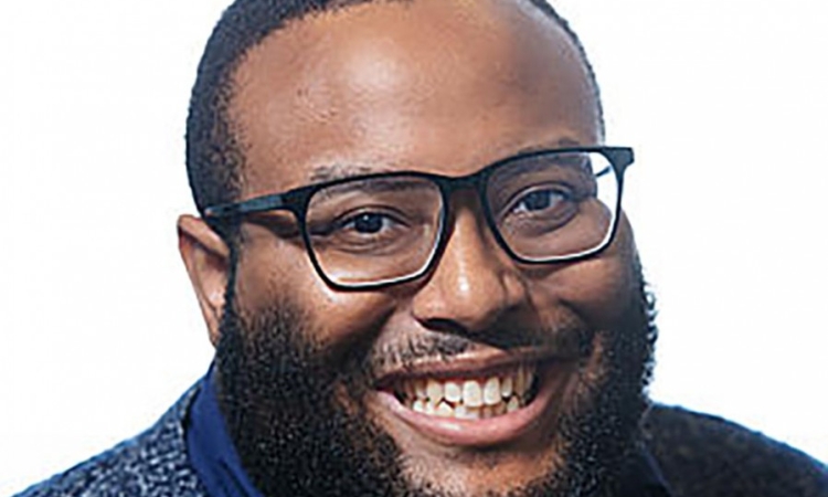 A closely cropped headshot of Andrew White 