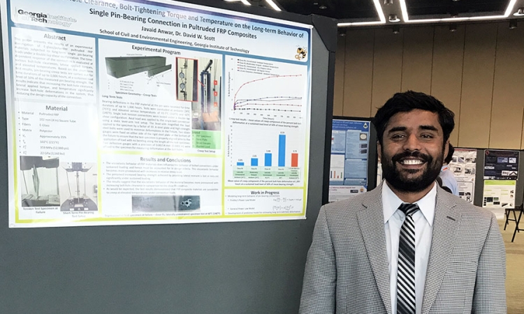 Ph.D. student Javaid Anwar with his first-place poster at the Society for the Advancement of Material and Process Engineering conference. (Photo: David Scott)