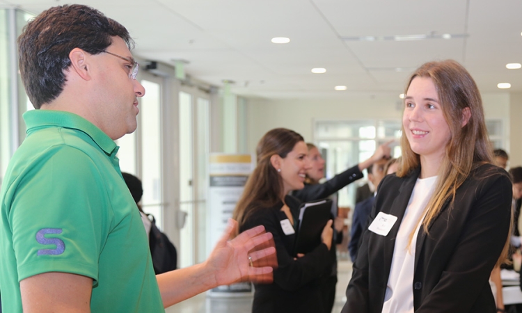 Skanska’s Jimmy Mitchell talks with a student at the School’s 2017 Career Expo. Mitchell, a 2005 civil engineering grad, has long been involved in mentoring Tech students. The School has launched a new program to involve more alumni in these kinds of relationships and is recruiting professionals and students. (Photo: Jess Hunt-Ralston)