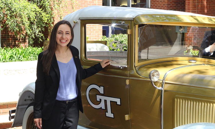 Hannah Greenwald poses for the traditional senior photo with the Georgia Tech Ramblin' Reck. Greenwald has won the top honor for Tech engineering students, the Davidson Family Tau Beta Pi Senior Engineering Cup. (Courtesy: Hannah Greenwald)