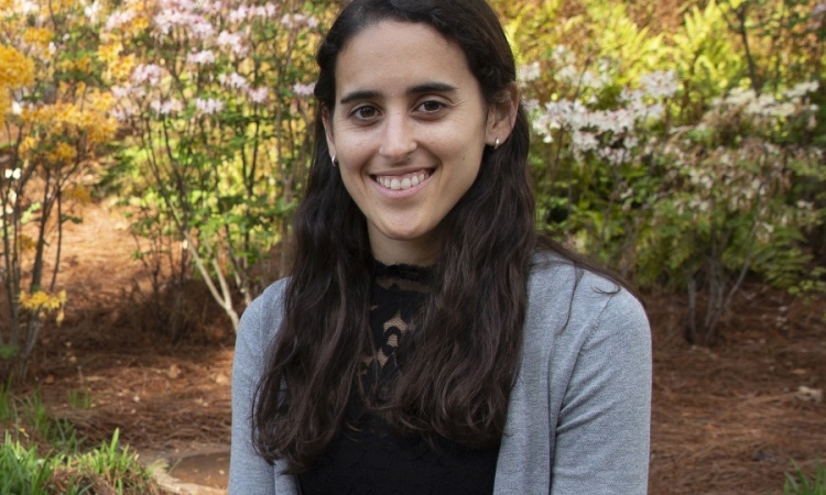 Emily Sanders smiles for a photograph. 