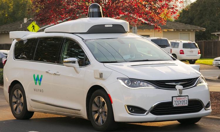 An autonomous Waymo Chrysler Pacifica drives around Los Altos, California. (Photo Courtesy: Dllu via Wikimedia Commons)