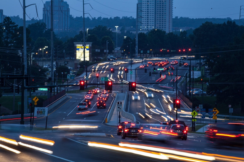 Traffic moves through the interchange at Ashford-Dunwoody Road and Interstate 285 in Atlanta's Perimeter area. The busy district is one of several areas where the Georgia Department of Transportation and some School of Civil and Environmental Engineering alumni at Kimley-Horn and Associates are using advanced technology and traffic signal timing to maximize the flow of traffic. (Photo Courtesy: Kimley-Horn and Associates)