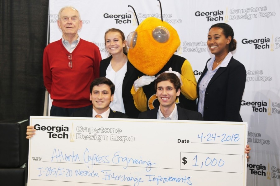 Atlanta Cypress Engineering won the civil and environmental engineering award at the spring 2018 Capstone Design Expo. The team poses with the winning check. From right: Blane Solomon, Andrew Pofahl, Buzz, Alex Hare, and Ramiro Santana along with senior design professor John Koon. (Photo: Jess Hunt-Ralston)