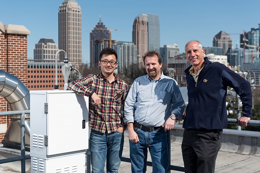 Hongyu Guo, Rodney Weber and Ted Russell on their research platform atop the Ford Environmental Science & Technology Building.