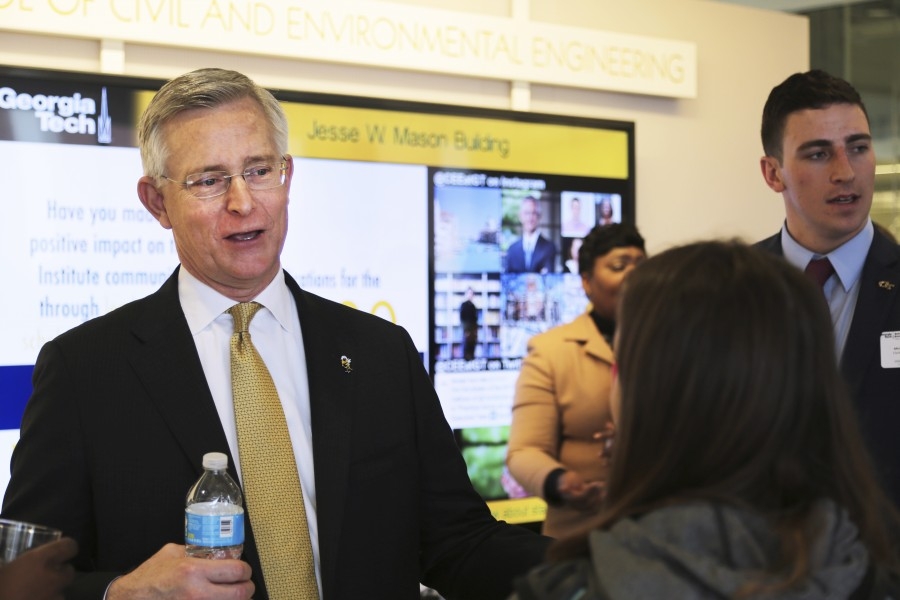 Bill Calhoun talks with students after his spring 2018 presentation for the Hyatt Distinguished Alumni Leadership Speaker Series. Calhoun, vice chairman and executive vice president of Clark Construction, talked about the five principles that guide how he leads people and his company. (Photo: Jess Hunt-Ralston)