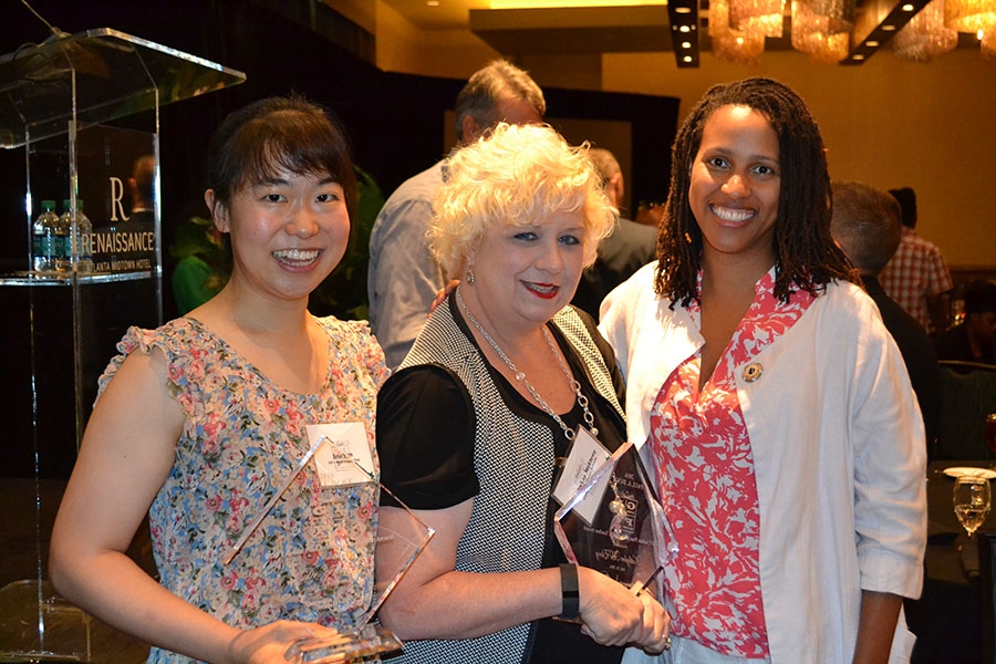 Iris Tien, left, with Gwinnett County middle school teacher Kathylee McElroy and Jamila Cola after Tien and McElroy won awards for their collaboration on engineering lesson plans for McElroy's science classes. They've been working together for two years through a program made possible by the National Science Foundation Partnerships for Research, Innovation, and Multi-Scale Engineering. Cola is the director of that program. (Photo Courtesy: Iris Tien)