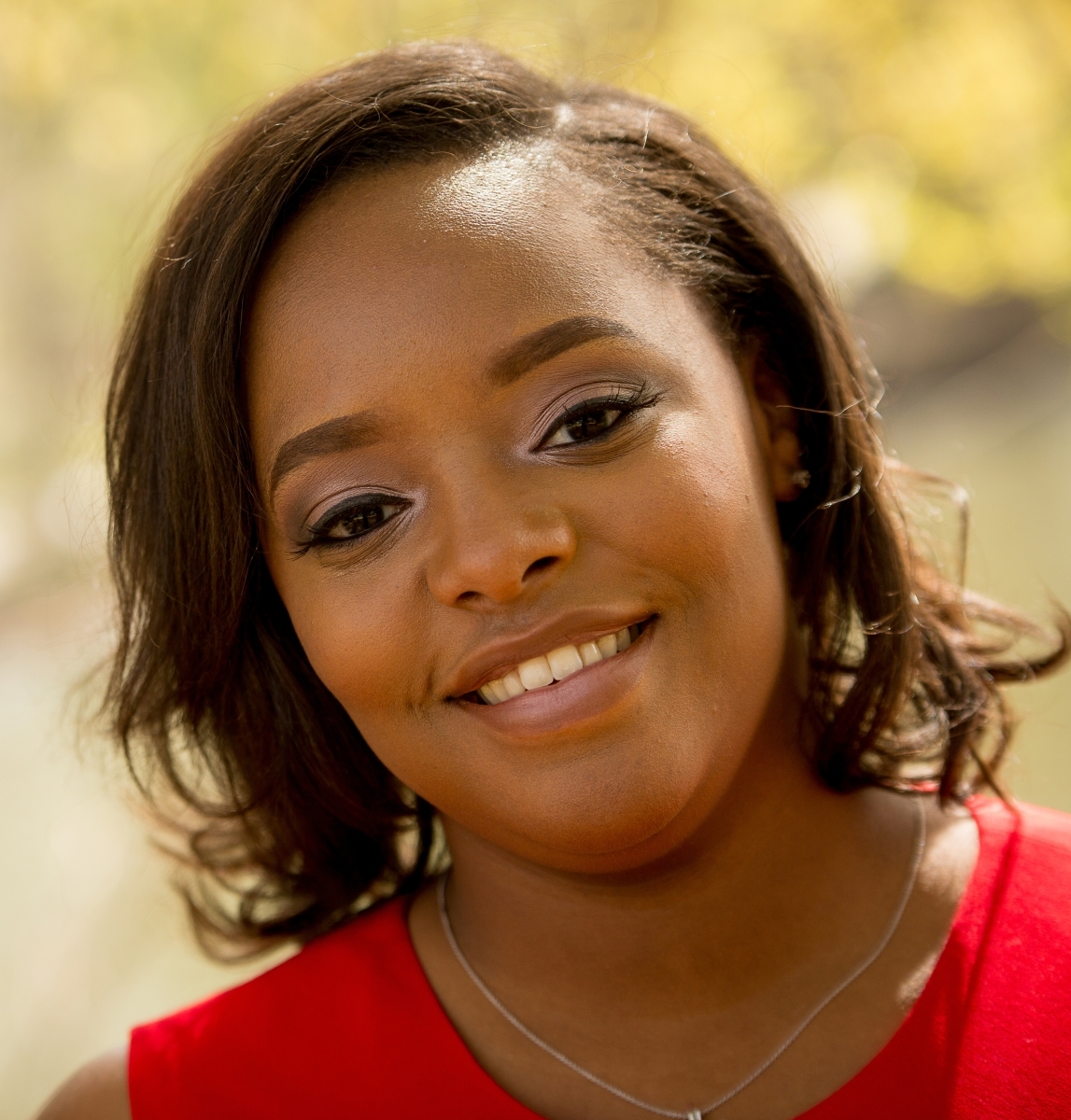 Portrait of Charise Fox wearing a red blouse