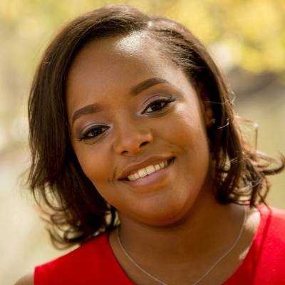 Portrait of Charise Fox wearing a red blouse