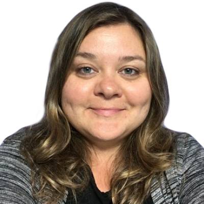 Portrait of Olga Menagarishvili wearing a black top and striped cardigan